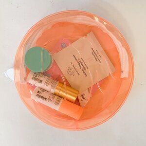 Drunk Elephant Sample Set in Round Cosmetic Bag